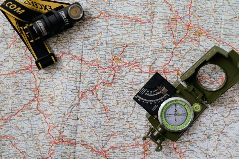 Map, compass, flashlight arrangement