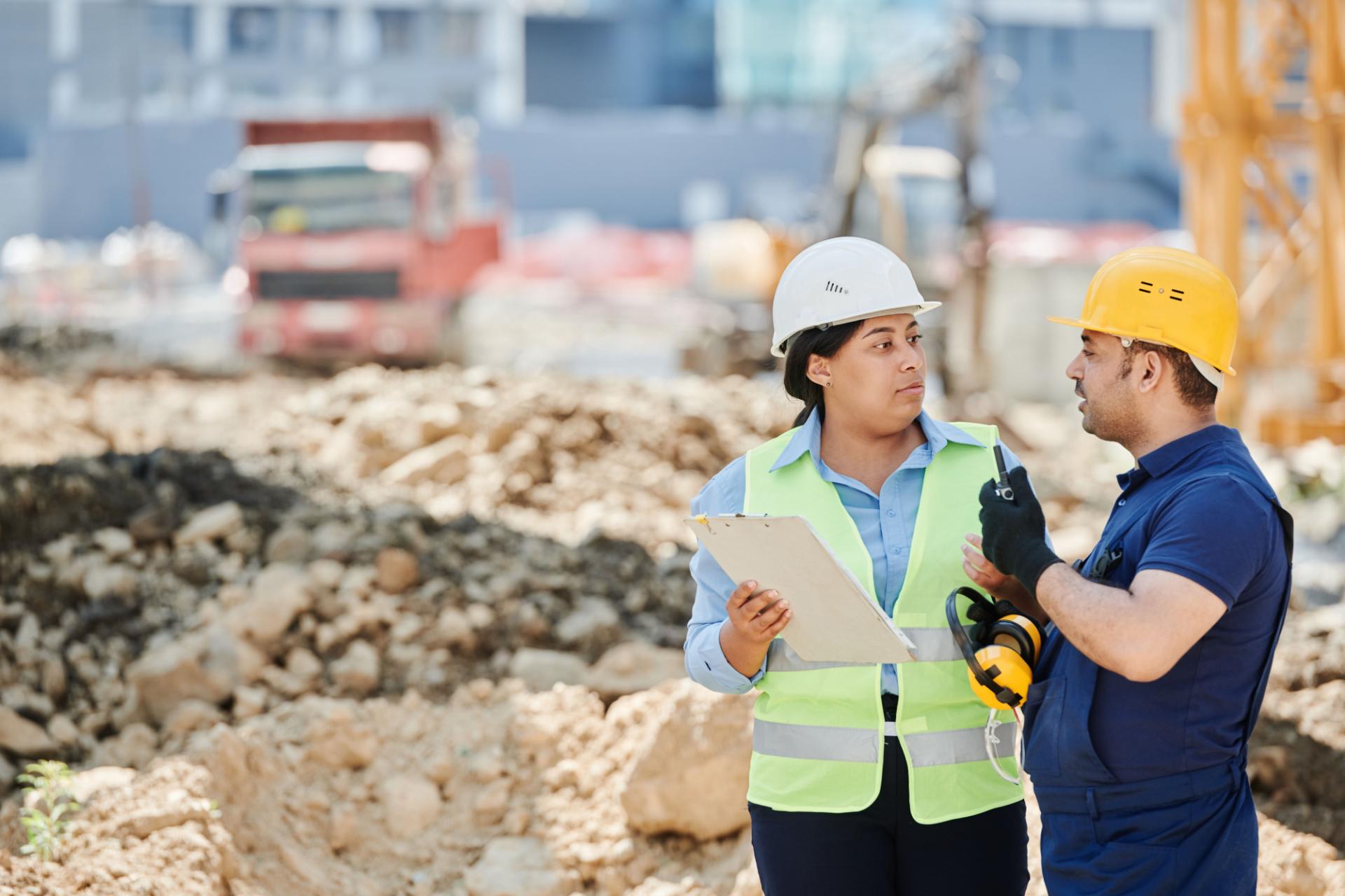 Construction workers discussing plans