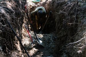 Person digging a trench